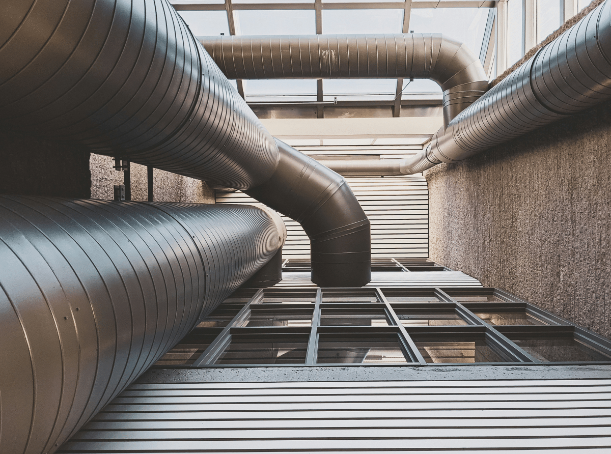 HVAC engineer reviewing technical drawings and system schematics