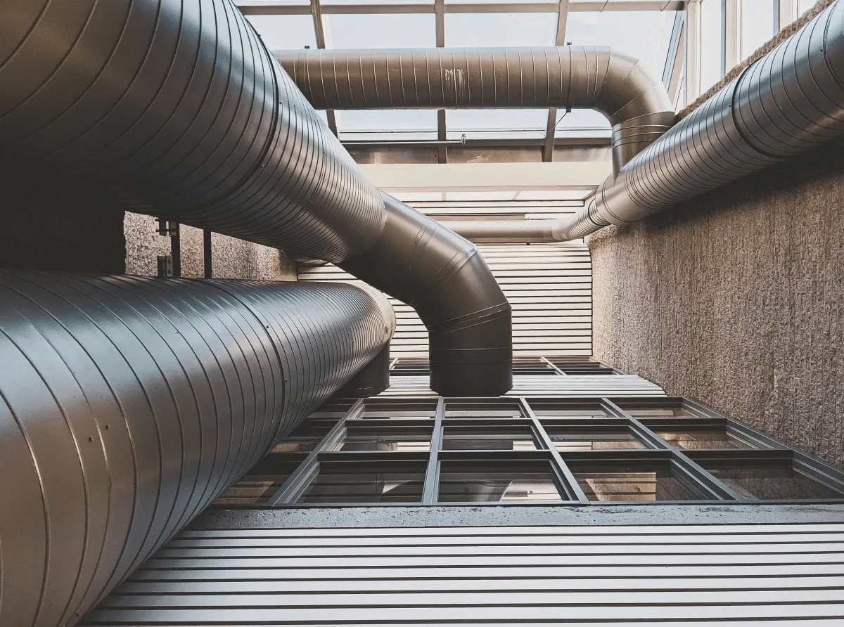 HVAC engineer reviewing technical drawings and system schematics