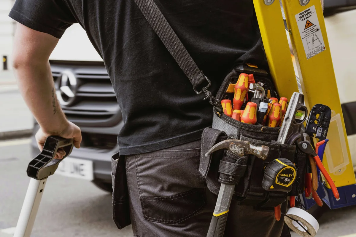Engineer carrying out planned preventative maintenance on HVAC equipment